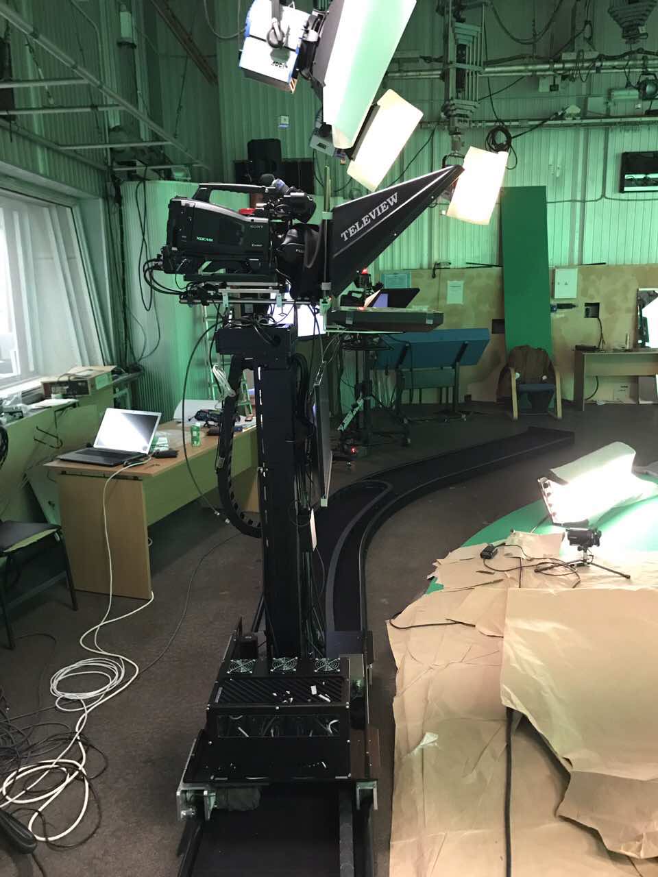 Специалисты ITDILAB разработали съемочной комплекс на роботизированная тележке для студии " Россия 24". Данный комплекс позволяет вести эфиры максимального качества с возможностью управления камерой по вертикали и горизонтали